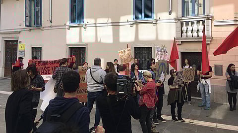 Activists in Koper, Slovenia, stage a demonstration urging authorities to inspect the cargo ship Borkum transporting weapons to Israel amid its ongoing genocide in Gaza, May 2024.