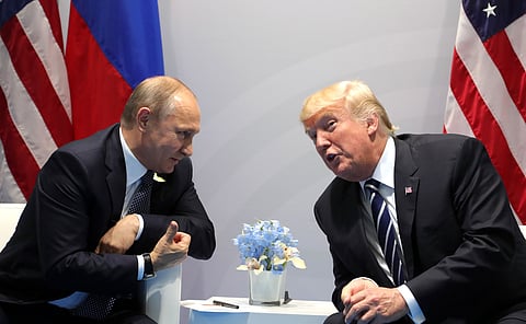 Donald Trump and Vladimir Putin convene at the 2017 G20 Summit in Hamburg.