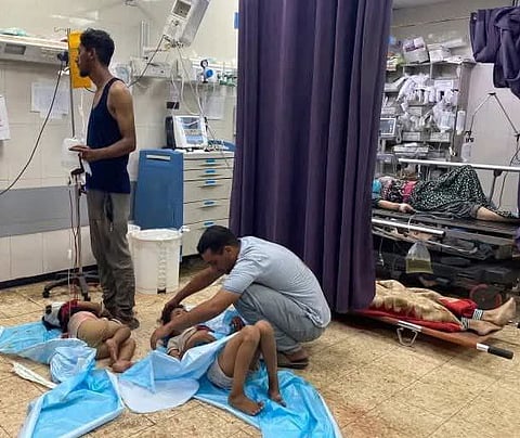 Children injured by Israeli strikes lying on the floor due to a severe shortage of beds in Gaza Hospitals.