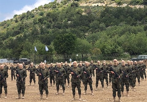 Hezbollah fighters during a drill in Aaramta, May, 2023