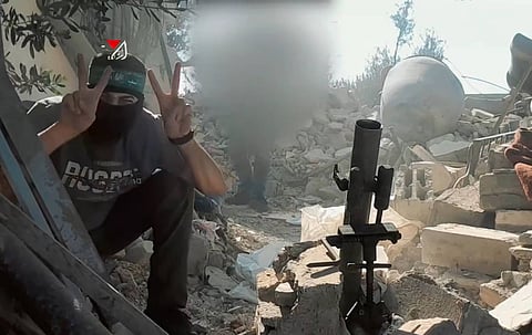 A Hamas soldier during a raid on an Israeli outpost in Gaza, 2025.