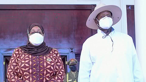 Tanzania's President Samia Suluhu Hassan with Yoweri Museveni, the President of Uganda.