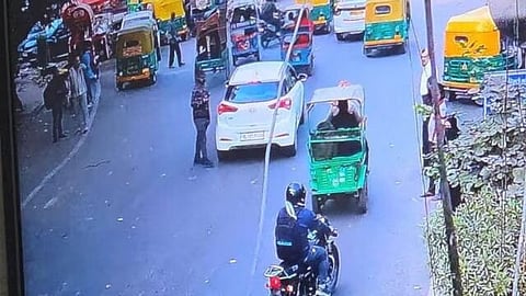A CCTV still of a white Hyundai i20 driving through a street in Delhi shortly before exploding.