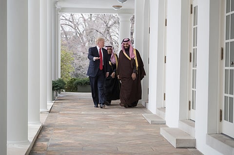 Donald Trump walks with the Saudi Arabia’s Crown Prince Mohammed bin Salman bin Abdulaziz Al Saud, Tuesday, March 14, 2017, along the Colonnade outside the Oval Office.