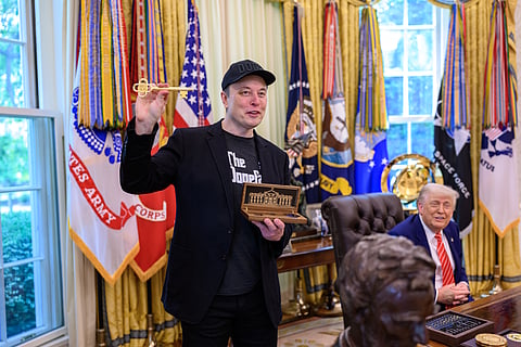 President Donald Trump participates in a press conference with departing DOGE adviser Elon Musk, Friday, May 30, 2025, in the Oval Office.