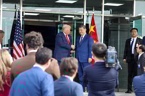 President Trump shakes hands with Chinese leader Xi Jinping at Gimhae airport in Busan, South Korea, October 30, 2025.
