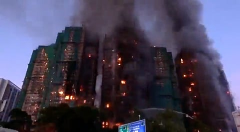 Hong Kong Apartment Fire Death Toll Reaches 128 as Corruption Probe Widens