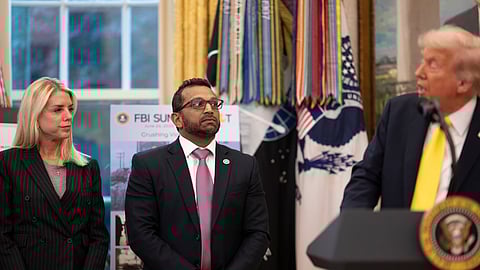 President Donald Trump participates in a press conference with FBI Director Kash Patel, Attorney General Pam Bondi on October 15, 2025, in the Oval Office.