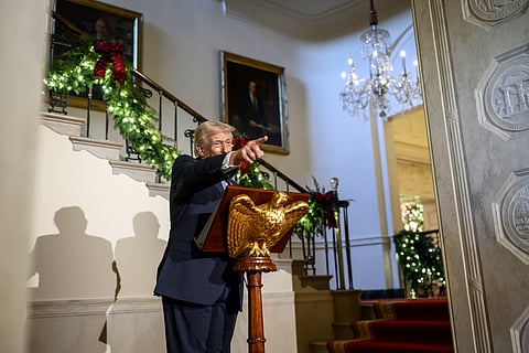 President Donald Trump delivers remarks to staff during a Christmas Reception in the White House, Monday, December 1, 2025.