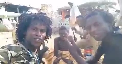 RSF militiamen film themselves mocking and harassing an injured civilian