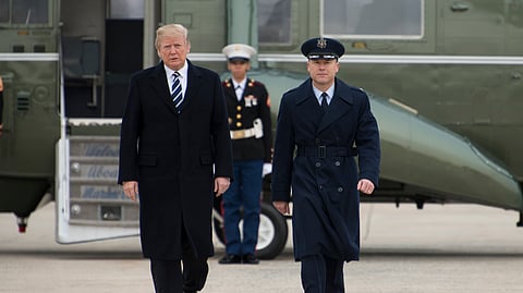 Col. Casey D. Eaton, 89th Airlift Wing commander, walks with President Donald Trump to Air Force One at Joint Base Andrews, Md., Feb. 1, 2018.