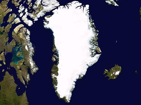 Satellite photo highlighting the island of Greenland, as well as Iceland and the Canadian Arctic Archipelago.