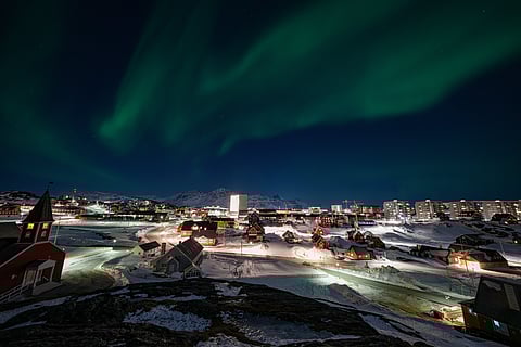 Nuuk, Greenland skyline with the aurora borealis.