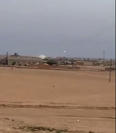 SDF forces firing from within al-Tabqah at Syrian troops in the northeast of Syria.