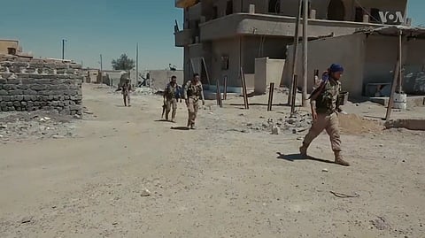 SDF fighters in Raqqa, on 12 July 2017.