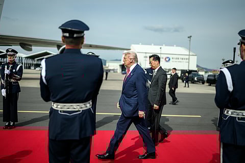 President Donald Trump greets officials before boarding Air Force One at Gimhae International Airport in Busan, South Korea on Thursday, October 30, 2025. 