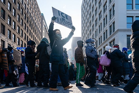 Protesters march at the ICE Out of MN march in Minneapolis, Minnesota, 23 January 2026.