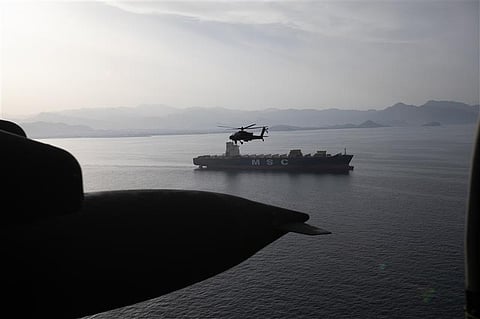 AH-64 Apaches fly above the Strait of Hormuz during a patrol, April 17. 
