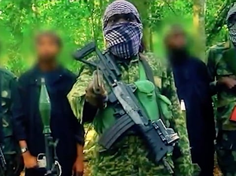 Armed ADF fighters seen in a propaganda video.