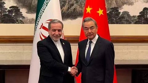 Iran's Foreign Minister Abbas Araghchi with China's Wang Yi in Beijing.