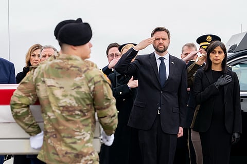 JD Vance attends a transfer ceremony at Dover Air Force Base with his wife Usha to receive the remains of six U.S. Army Reserve soldiers killed in an Iranian drone strike in Kuwait, March 8, 2026.