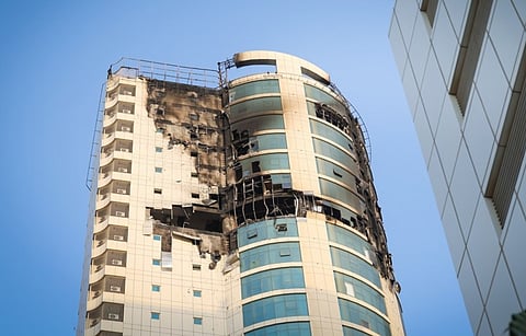 A damaged building after an Iranian strike in Manama, Bahrain, March 2026.