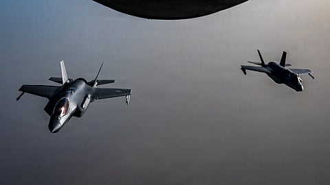 Two U.S. Air Force F-35A stealth fighter jets fly over the Middle East during a patrol.