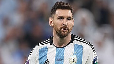 Lionel Messi playing for Argentina at the 2022 FIFA World Cup.