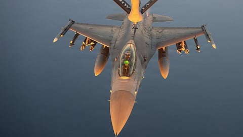 A KC-135 Stratotanker refuels U.S. Air Force F-16 fighter jets while flying a patrol over the Middle East.