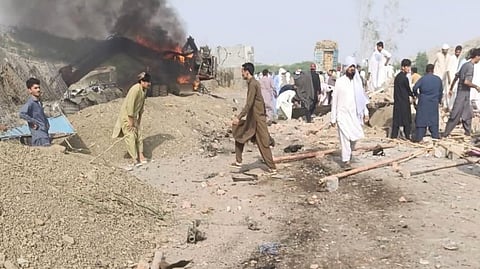 Suicide Bombing at Pakistan Police Checkpoint Kills at Least 12 People
