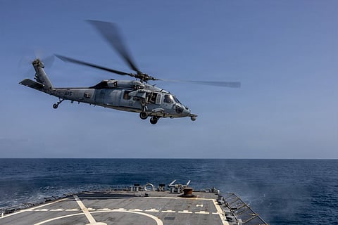 A U.S. Navy MH-60S Sea Hawk takes off from the flight deck of USS John Paul Jones (DDG 53) / Image for illustrative purposes. 