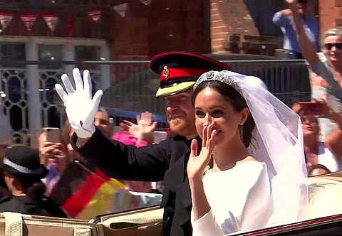 Prince Harry and his wife Meghan Markle.