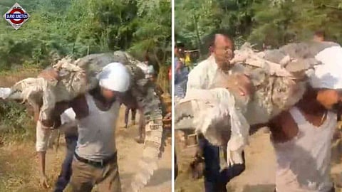Young man in Uttar Pradesh's Hamirpur district has gone viral for carrying a 10-foot crocodile on his shoulders.