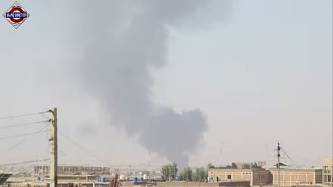 Smoke billows from the Afghanistan side following exchanges of fire between Pakistani and Afghan forces.