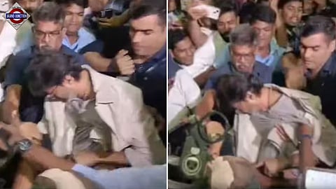 Vijay falls amid fan surge at Chennai airport after Jana Nayagan event. 