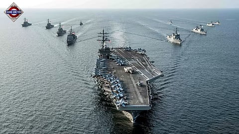 The US Navy aircraft carrier USS Abraham Lincoln sailing with it's escort ships as part of a carrier strike group.