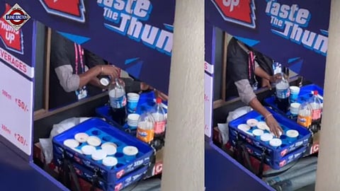 Vendor refills bottle at Arun Jaitley Stadium 
