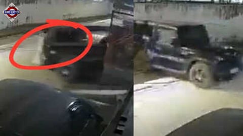 The car started rolling backward as the woman was closing the gate of the property. 