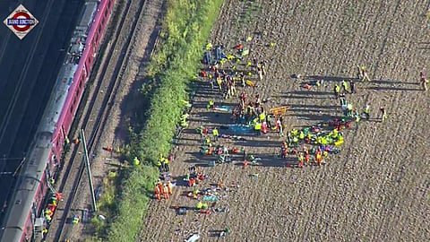 Two trains collided about 60 miles north of London on Friday, with multiple injuries reported.