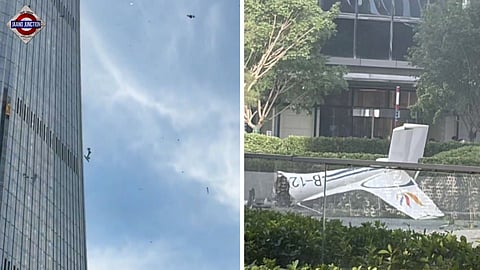 Small Chinese aircraft hits Beijing's tallest building.