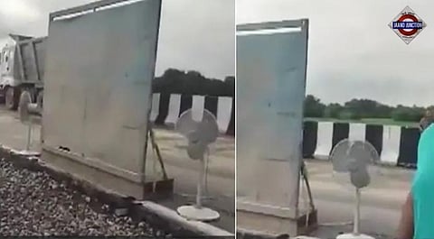Industrial fans dry the damaged Kanpur-Lucknow Expressway stretch after heavy rainfall triggered a road slip, with repair work and traffic diversions underway.