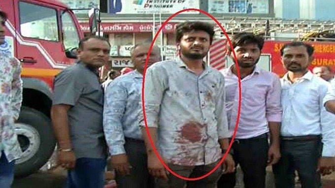 குஜராத் தீ விபத்து - எட்டு மாணவர்களின் உயிரை காப்பாற்றிய வியாபாரி !