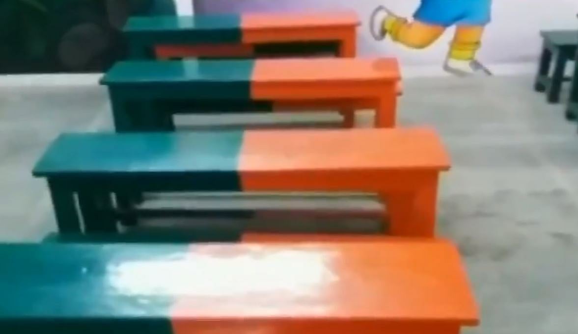 பா.ஜ.க கொடி வண்ணம் பூசப்பட்ட  அரசு பள்ளி இருக்கைகள்! கடும் எதிர்ப்பை அடுத்து அகற்றம்