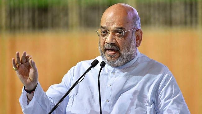 அசாம் போல நாடு முழுவதும் தேசிய குடியுரிமைப் பதிவேடு அமல்படுத்தப்படும் - அமித் ஷா கிளப்பிய அடுத்த சர்ச்சை 