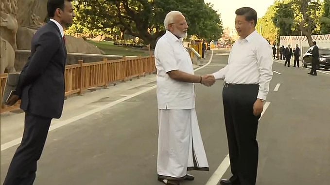 சீன அதிபர் மற்றும் மோடியுடன் இருக்கும் இன்னொருவர் யார்? - தமிழர்களுக்குப் பெருமை சேர்த்த மது சுதன்!