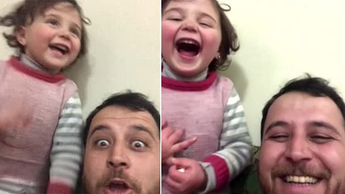 “குண்டுச் சத்தம் கேட்டால் மகளை சிரிக்கச் சொல்லும் தந்தை” : சிரிய போரின் பின்னே வேதனைக் கதை! #ViralVideo