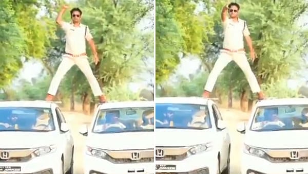 “ஓடும் கார் மீது சிங்கம் பட பாணியில் சாகசம்” : மத்திய பிரதேச போலிஸ் எஸ்.ஐ.,க்கு நேர்ந்த கதி! - video