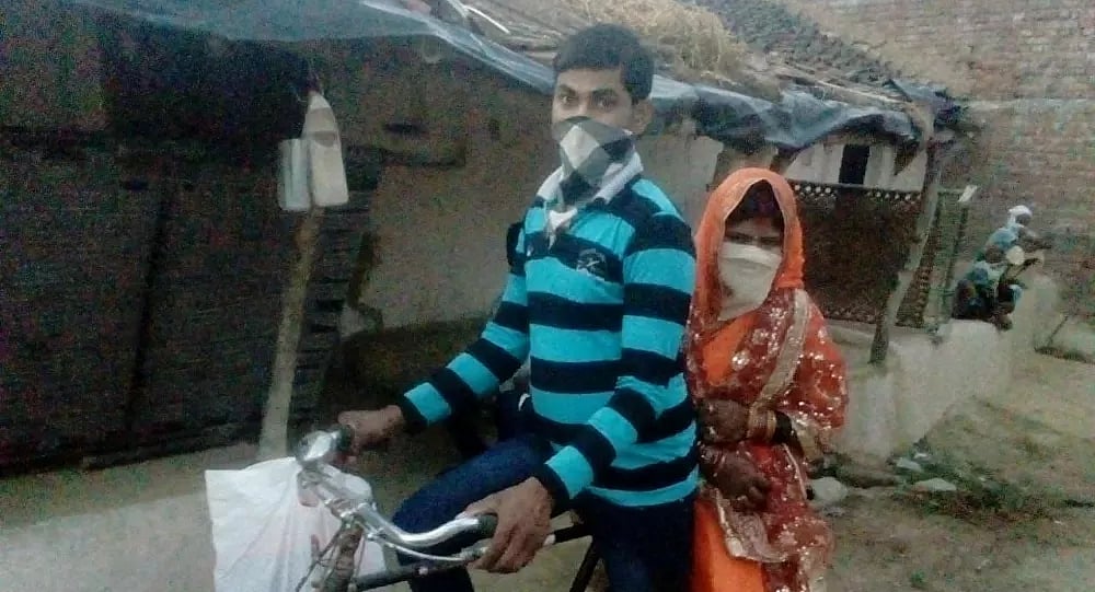 '100 கி.மீ தூரம் சைக்கிளில் சென்று திருமணம்' - மணப்பெண்ணுடன் ஊர் திரும்பிய இளைஞர் : ஊரடங்கில் ஒரு சாகசம்!