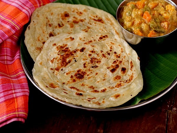 “பரோட்டாவிற்கு 18% GST வரி”: தென்னிந்தியர்களின் விருப்ப உணவில் கை வைப்பதா? - கொந்தளிக்கும் இணையவாசிகள்!