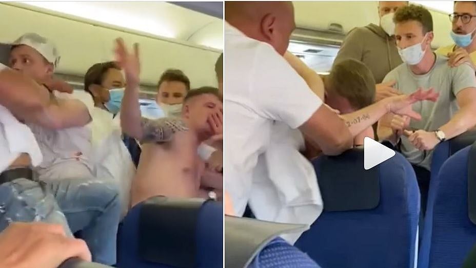 முகக்கவசம் அணியாததால் அந்தரத்தில் விமானத்துக்குள் அடிதடி! #ViralVideo